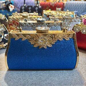Sparkling Blue Clutch with Gold Detailing with Crossbody chain strap